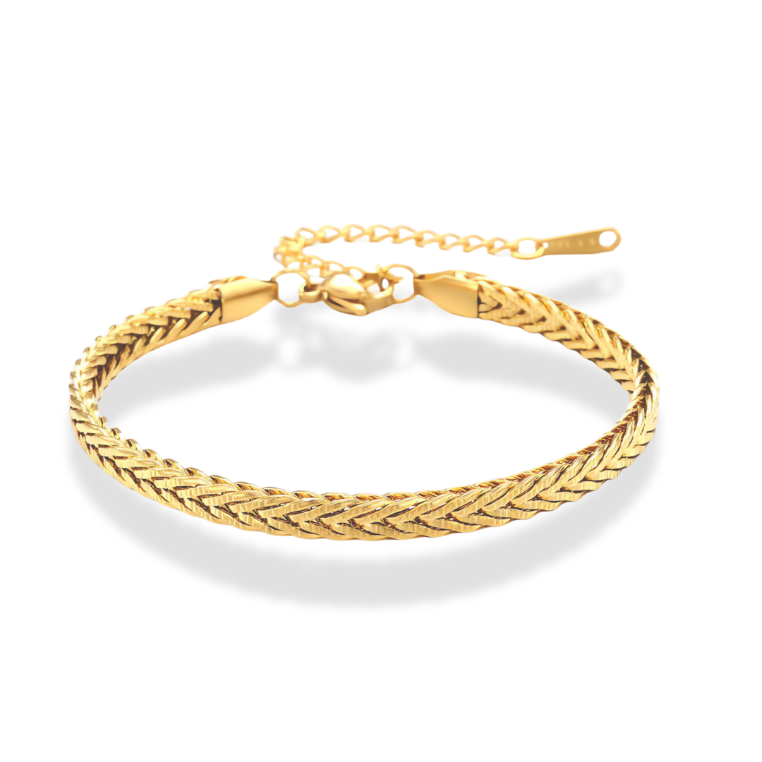 gold bracelet with a fishtail braid design.
